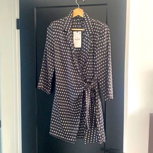 Zara- Mod style wrap dress new with tags size medium. Inner clasp to keep closed